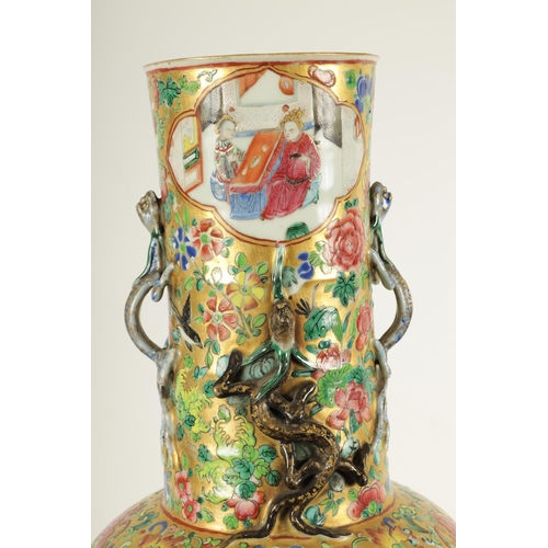 164 - A LARGE 19TH CENTURY CHINESE FAMILLE ROSE PORCELAIN VASE with gilt floral ground enclosing two large... 