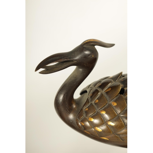 167 - A PAIR OF JAPANESE MEIJI PERIOD BRONZE AND GOLD INLAID CENSERS modelled as perched cranes with lift ... 