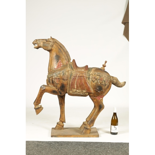 168 - A MID 19TH CENTURY CHINESE TANG DYNASTY STYLE POLYCHROME DECORATED CARVED SCULPTURE OF A HORSE with ... 