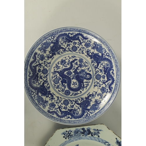 179 - AN 18TH CENTURY CHINESE BLUE AND WHITE OCTAGONAL DISH with floral landscape centre TOGETHER WITH A 2... 