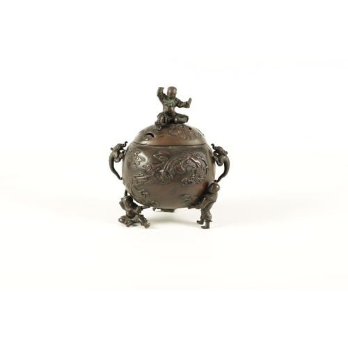 180 - A JAPANESE MEIJI PERIOD PATINATED BRONZE KORO AND COVER the domed lid surmounted by a seated man on ... 