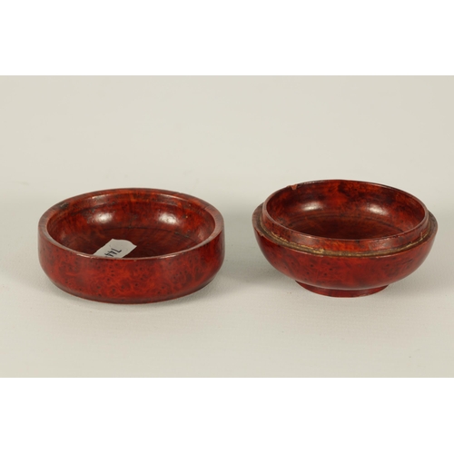 182 - A 19TH CENTURY CHINESE BURR-WOOD TURNED LIDDED BOX with red laquer finish. (8cm diameter 5cm high )