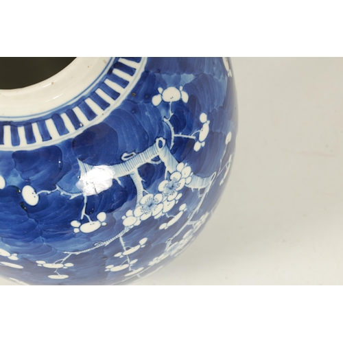 187 - A 19TH CENTURY CHINESE BLUE AND WHITE PRUNUS BLOSSOM GINGER JAR AND COVER of bulbous form having fou... 