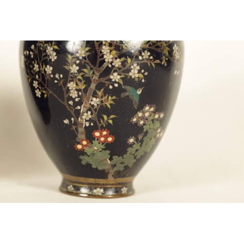 189 - A SMALL PAIR OF JAPANESE MEIJI PERIOD CLOISONNE VASES dark blue ground and decorated with silver wir... 