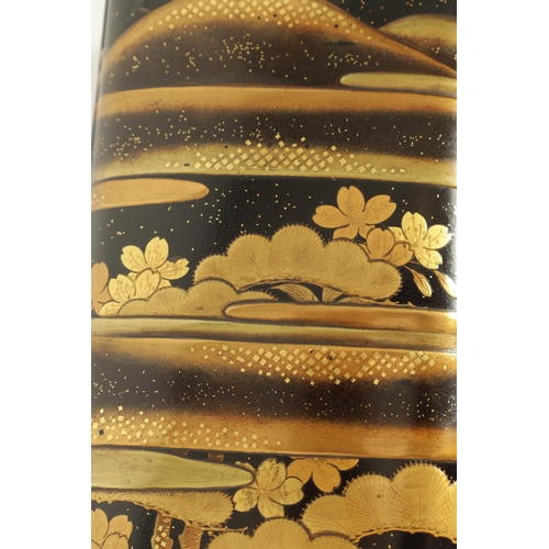 191 - A JAPANESE MEIJI PERIOD BLACK LACQUERWORK SCROLL BOX with raised gilt decoration of prunus trees in ... 