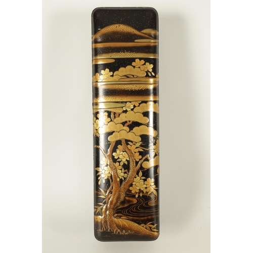 191 - A JAPANESE MEIJI PERIOD BLACK LACQUERWORK SCROLL BOX with raised gilt decoration of prunus trees in ... 