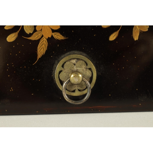 191 - A JAPANESE MEIJI PERIOD BLACK LACQUERWORK SCROLL BOX with raised gilt decoration of prunus trees in ... 