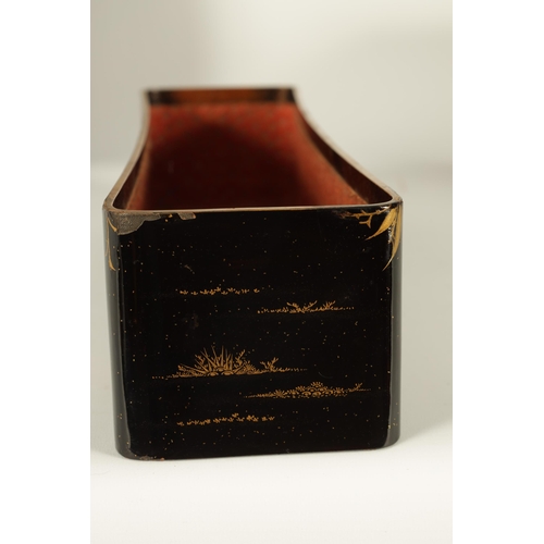 191 - A JAPANESE MEIJI PERIOD BLACK LACQUERWORK SCROLL BOX with raised gilt decoration of prunus trees in ... 