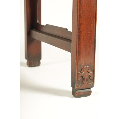 192 - A 19TH CENTURY CHINESE HARDWOOD ALTAR TABLE the cleated top with carved scrolled ends and cut-out fr... 