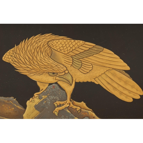 197 - A FINE JAPANESE MEIJI PERIOD LACQUERWORK LIDDED BOX with raised gilded eagle and mountainous landsca... 