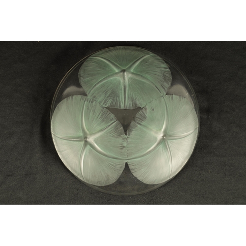 20 - A FRENCH RENE LALIQUE 'VOLUBILIS' OPALESCENT GREEN STAINED GLASS DISH having Lily designs to the cen... 