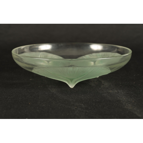 20 - A FRENCH RENE LALIQUE 'VOLUBILIS' OPALESCENT GREEN STAINED GLASS DISH having Lily designs to the cen... 