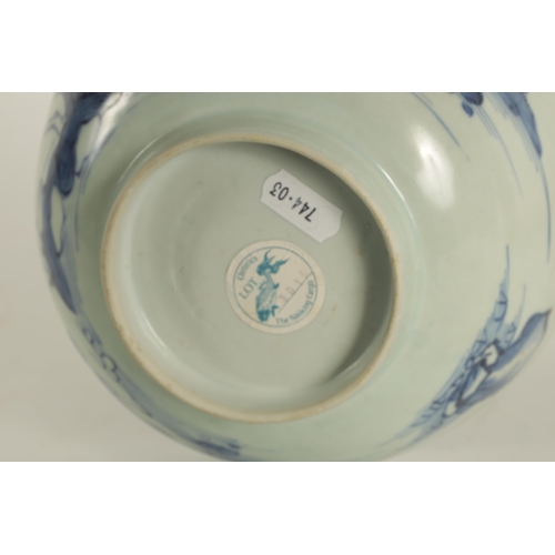 207 - AN 18TH CENTURY CHINESE BLUE AND WHITE BOWL FROM THE NANKING CARGO decorated lake and rocky landscap... 