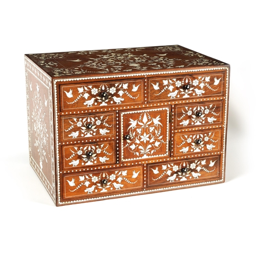 208 - A GOOD 19TH CENTURY ANGLO INDIAN HARDWOOD AND IVORY INLAID TABLE CABINET fitted small drawers to the... 