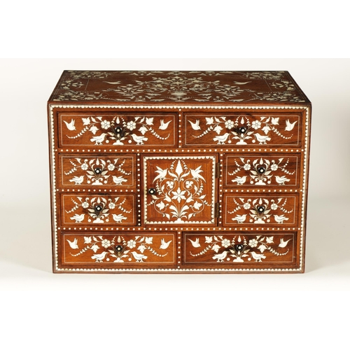 208 - A GOOD 19TH CENTURY ANGLO INDIAN HARDWOOD AND IVORY INLAID TABLE CABINET fitted small drawers to the... 