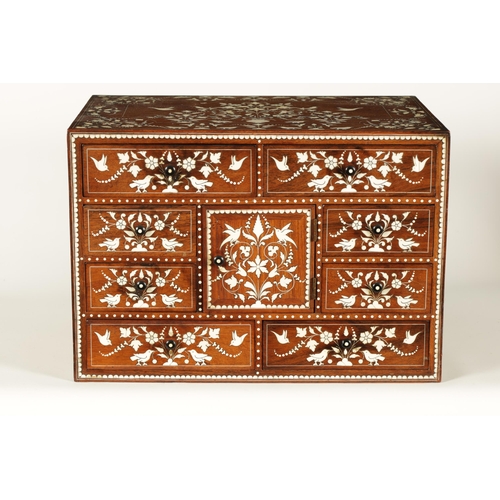 208 - A GOOD 19TH CENTURY ANGLO INDIAN HARDWOOD AND IVORY INLAID TABLE CABINET fitted small drawers to the... 