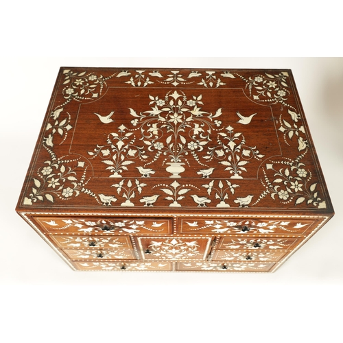 208 - A GOOD 19TH CENTURY ANGLO INDIAN HARDWOOD AND IVORY INLAID TABLE CABINET fitted small drawers to the... 