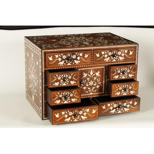 208 - A GOOD 19TH CENTURY ANGLO INDIAN HARDWOOD AND IVORY INLAID TABLE CABINET fitted small drawers to the... 