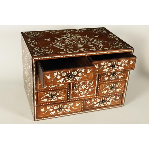 208 - A GOOD 19TH CENTURY ANGLO INDIAN HARDWOOD AND IVORY INLAID TABLE CABINET fitted small drawers to the... 