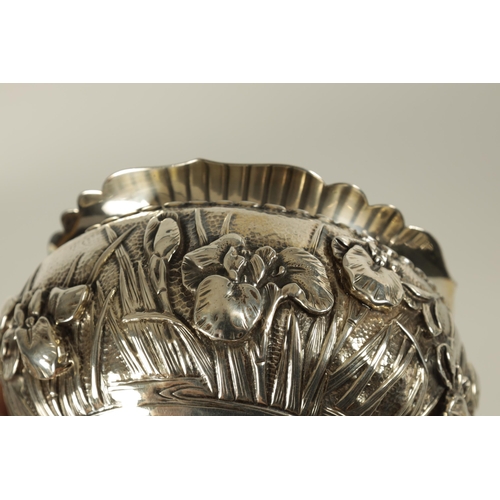 215 - A JAPANESE MEIJI PERIOD SOLD SILVER IRIS BOWL scalloped flared rim above a footed bulbous body decor... 