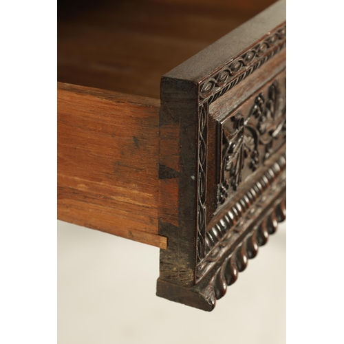 217 - A REGENCY ANGLO INDIAN CARVED HARDWOOD LIBRARY TABLE of good colour and patina, the polished top wit... 