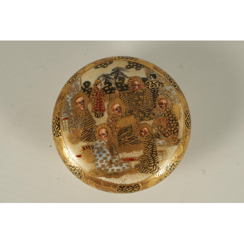 220 - A JAPANESE MEIJI PERIOD SATSUMA LIDDED BOWL decorated with seated figures in ritual garden scenes em... 