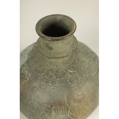 221 - A 19TH CENTURY ISLAMIC BRONZE CIRCULAR BULBOUS ENGRAVED VASE together with AN ORIENTAL CENSER DEPICT... 