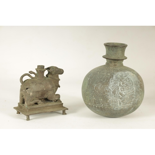 221 - A 19TH CENTURY ISLAMIC BRONZE CIRCULAR BULBOUS ENGRAVED VASE together with AN ORIENTAL CENSER DEPICT... 