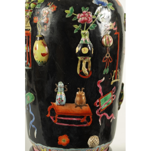 223 - A PAIR OF CHINESE REPUBLIC FAMILLE NOIRE PORCELAIN VASES CONVERTED INTO TABLE LAMPS each decorated w... 