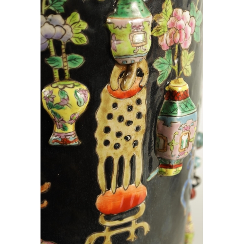 223 - A PAIR OF CHINESE REPUBLIC FAMILLE NOIRE PORCELAIN VASES CONVERTED INTO TABLE LAMPS each decorated w... 