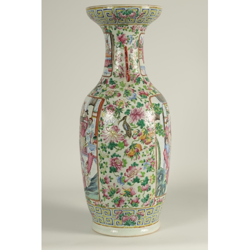 228 - AN EARLY 20TH CENTURY CHINESE FAMILLE ROSE PORCELAIN VASE of baluster form having scenic panels amon... 