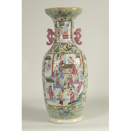 228 - AN EARLY 20TH CENTURY CHINESE FAMILLE ROSE PORCELAIN VASE of baluster form having scenic panels amon... 