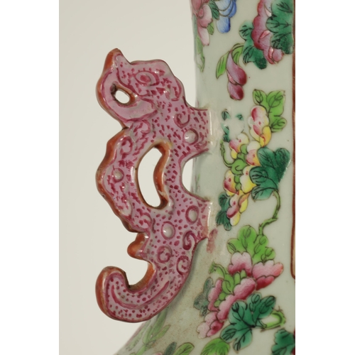 228 - AN EARLY 20TH CENTURY CHINESE FAMILLE ROSE PORCELAIN VASE of baluster form having scenic panels amon... 