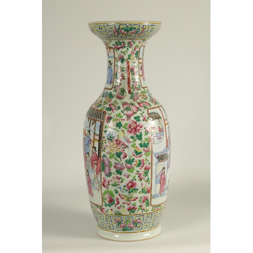 228 - AN EARLY 20TH CENTURY CHINESE FAMILLE ROSE PORCELAIN VASE of baluster form having scenic panels amon... 