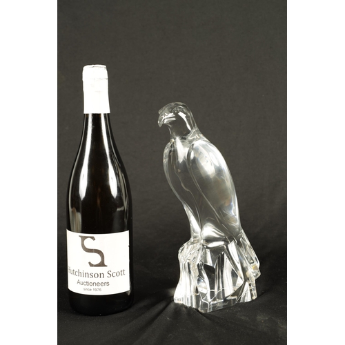 23 - A 20TH CENTURY BACCARAT CLEAR GLASS SCULPTURE FORMED AS A FALCON etched signiature to underside (25.... 