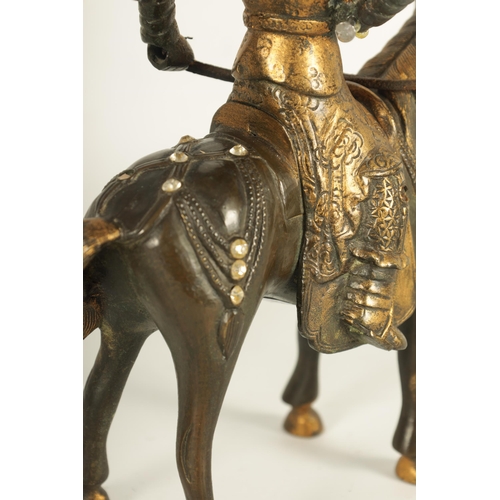 230 - A PAIR OF GILT BRONZE 18TH CENTURY STYLE CHINESE EQUESTRIAN FIGURES of mounted warriors with jewelle... 