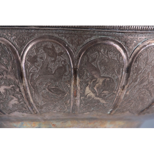 233 - A 19TH CENTURY EASTERN SILVERED BRONZE BOWL finely decorated with panels of woodland animals - signe... 