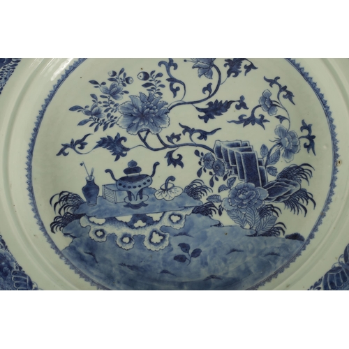 237 - AN 18TH/19TH CENTURY CHINESE BLUE AND WHITE LARGE SHALLOW DISH with a moulded centre edge, decorated... 