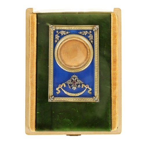 252 - FABERGE. AN EARLY 20TH CENTURY CASED RUSSIAN SILVER-GILT ENAMEL AND NEPHRITE PORTRAIT FRAME the imag... 