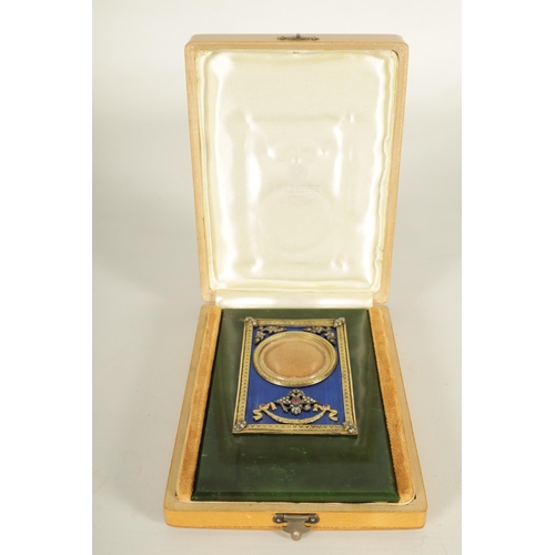 252 - FABERGE. AN EARLY 20TH CENTURY CASED RUSSIAN SILVER-GILT ENAMEL AND NEPHRITE PORTRAIT FRAME the imag... 