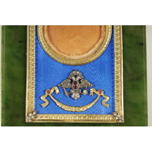 252 - FABERGE. AN EARLY 20TH CENTURY CASED RUSSIAN SILVER-GILT ENAMEL AND NEPHRITE PORTRAIT FRAME the imag... 