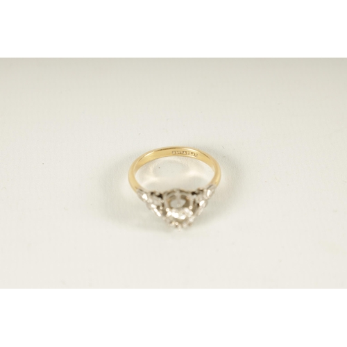 276 - AN 18CT YELLOW GOLD AND PLATINUM SOLITAIRE DIAMOND RING the brilliant cut diamond of good colour and... 