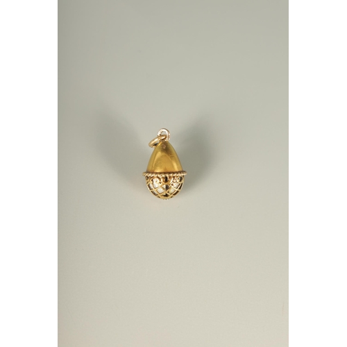 280 - A LATE 19TH CENTURY FABERGE 14CT GOLD ENAMEL AND RUBY PENDANT EGG, WORKMASTER HENRIK WIGSTROM the eg... 