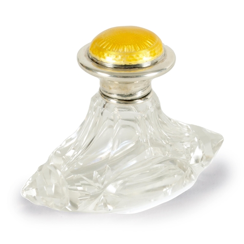 282 - AN ART DECO SILVER AND GUILLOCHE ENAMEL CUT GLASS SCENT BOTTLE the flared silver lid with a yellow s... 