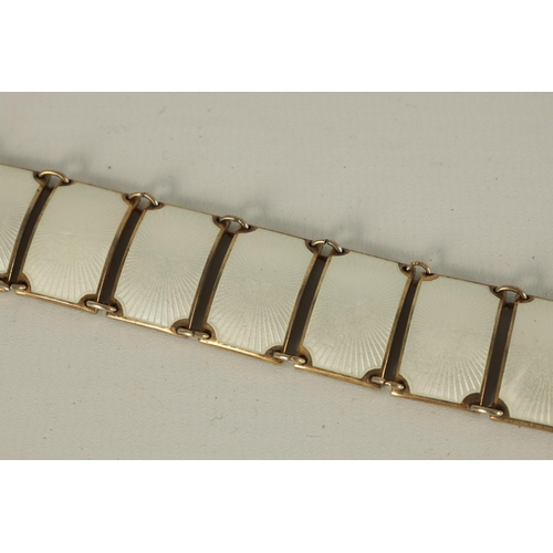 284 - A FINE NORWEGIAN SILVER AND GUILLOCHE ENAMEL SMALL BRACELET of segmented form with rectangular sunbu... 