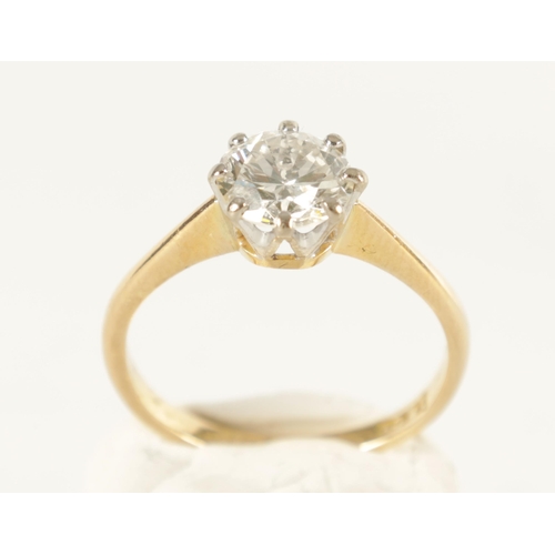 287 - A LADIES 18CT GOLD 1.5CT DIAMOND SOLITAIRE RING with brilliant cut diamond set in a white gold crown... 