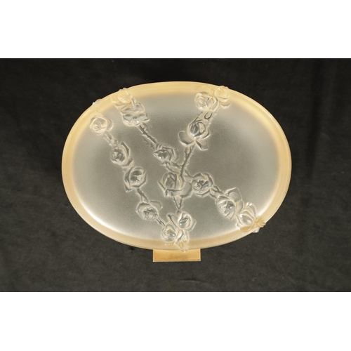 29 - LALIQUE, FRANCE. A 20TH CENTURY COPPELIA OVAL FROSTED GLASS DRESSING TABLE BOX decorated with Roses,... 