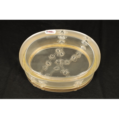 29 - LALIQUE, FRANCE. A 20TH CENTURY COPPELIA OVAL FROSTED GLASS DRESSING TABLE BOX decorated with Roses,... 