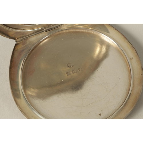 290 - A GEORGE VI SILVER AND GUILLOCHE ENAMEL HORSESHOE SHAPED COMPACT with sunburst design opening to rev... 