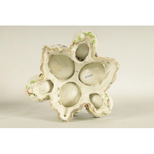 33 - AN UNUSUAL 18TH CENTURY BOW PORCELAIN SWEET MEAT STAND of two-tier form with centre shell work handl... 